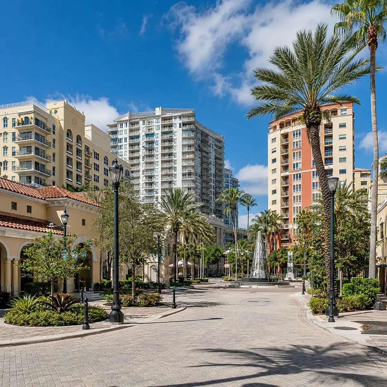 Street in Downtown Hollywood featuring tall apartment buildings and condos