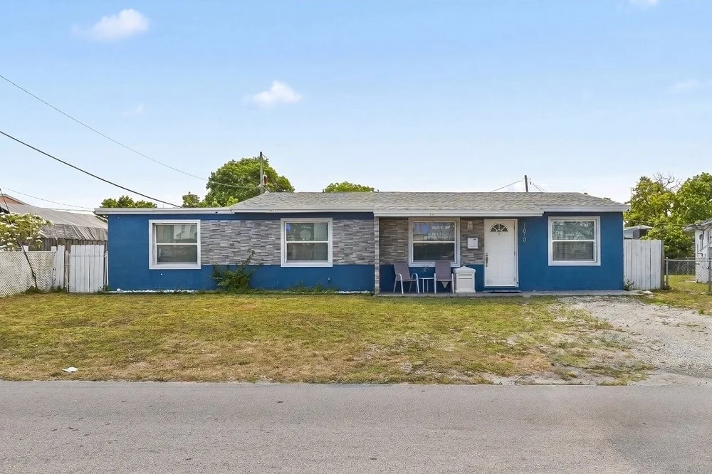Closed Cash deal with AHB hollywood home, blue bungalow and grass front yard