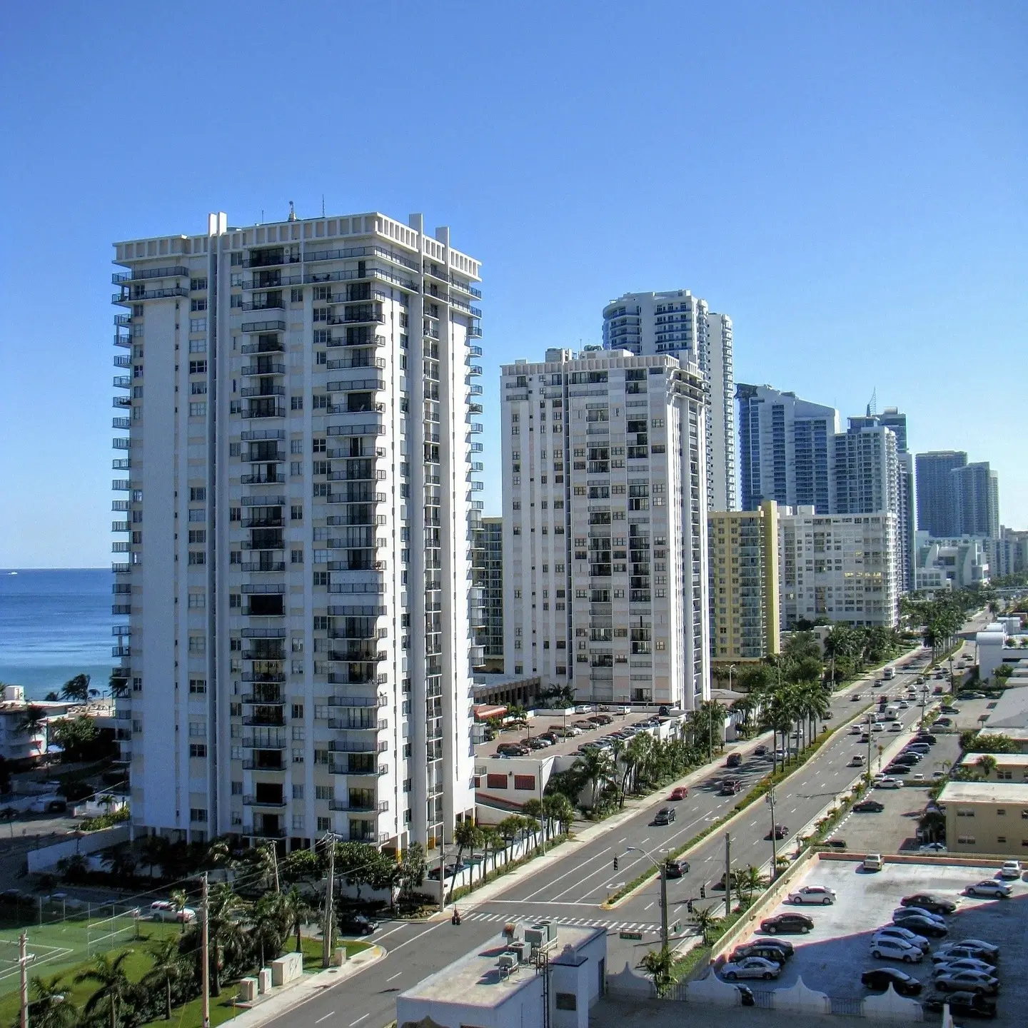 Tall apartment buildings overlooking the sea in The Crossings, Coral Springs, Fl