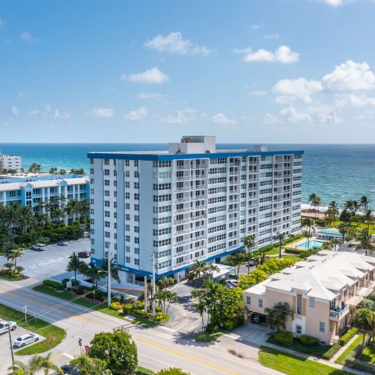 Oceanfront high-rise condo building with pool on the barrier island in Vero Beach