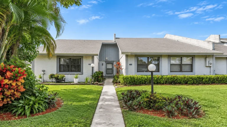 Margate home with greenery front yard