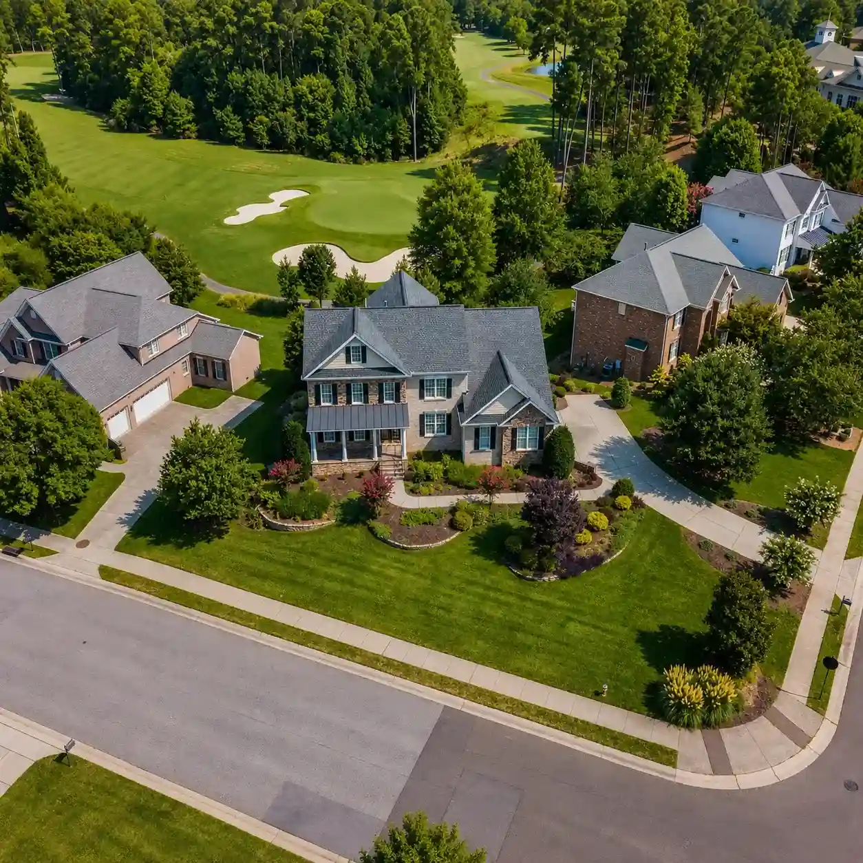 Zoomed-in Aerial view of Palm Aire, Pompano Beach, FL featuring detached family homes and large spacious green grounds