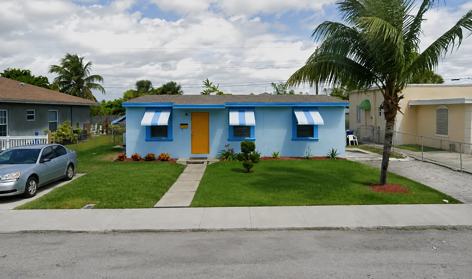 Blue painted home in Pompano Beach sold for cash