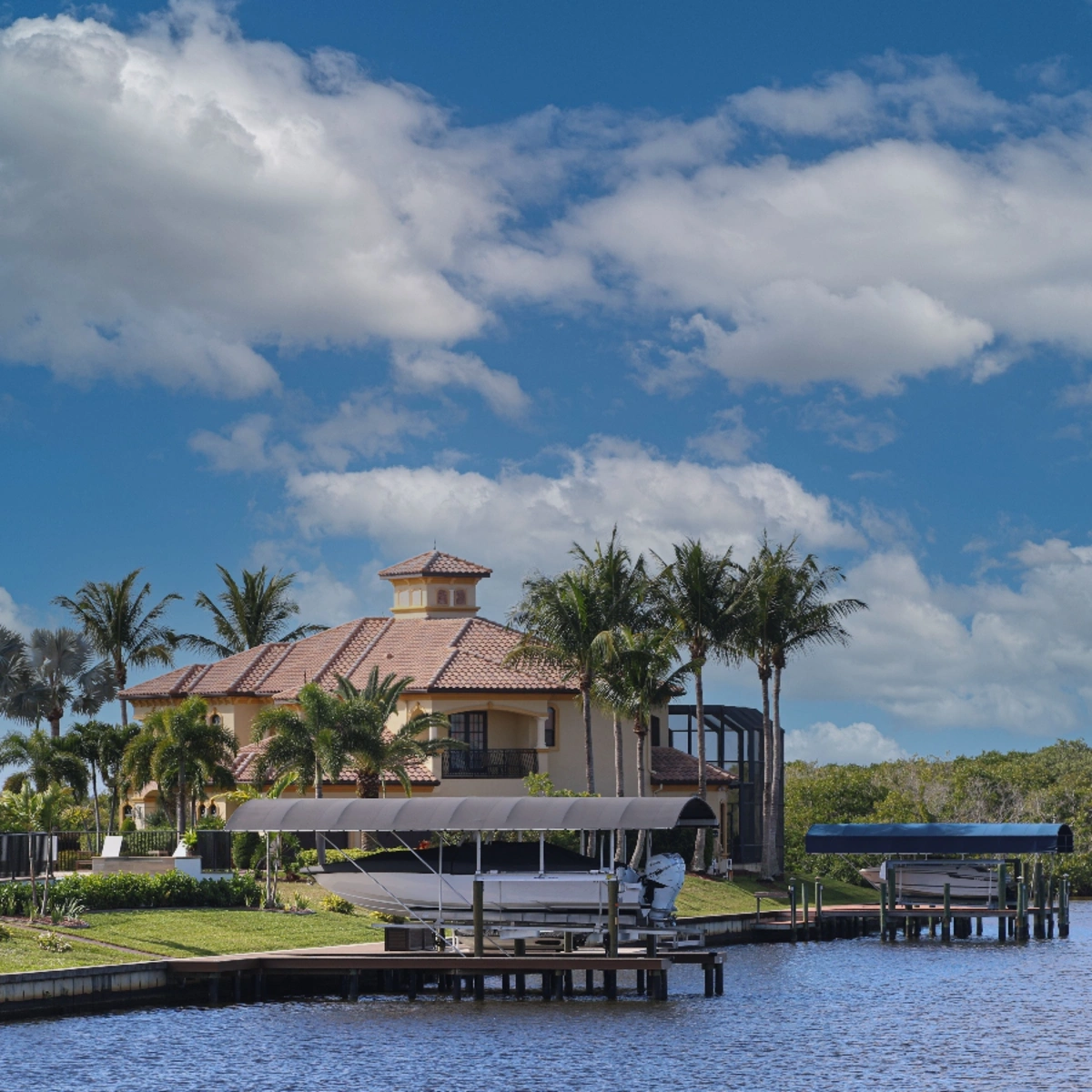 Waterfront estate home with private boat docks in The Hamptons of North Lauderdale